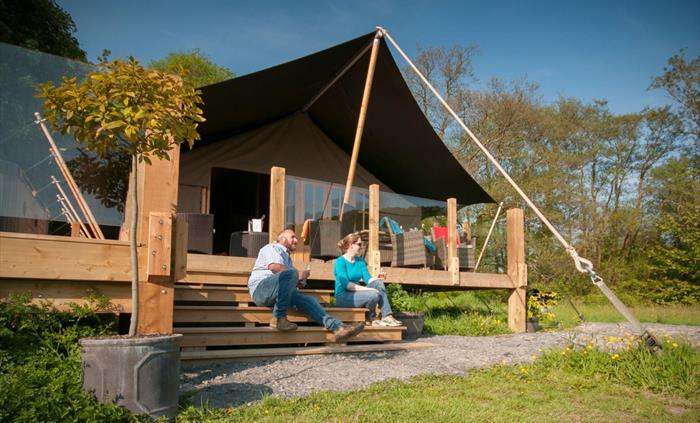 Camnant is our 4 bed (8 person) Safari Tent with large Hot Tub and Sun Deck overlooking meadow